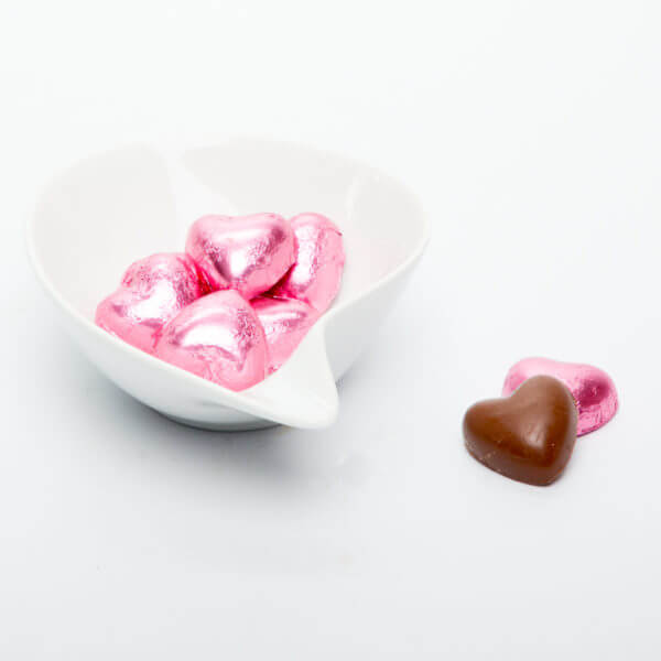 Lille chokoladehjerte pakket ind i pink folie